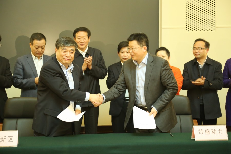沈北新區(qū)區(qū)長金志生與邱則有簽約